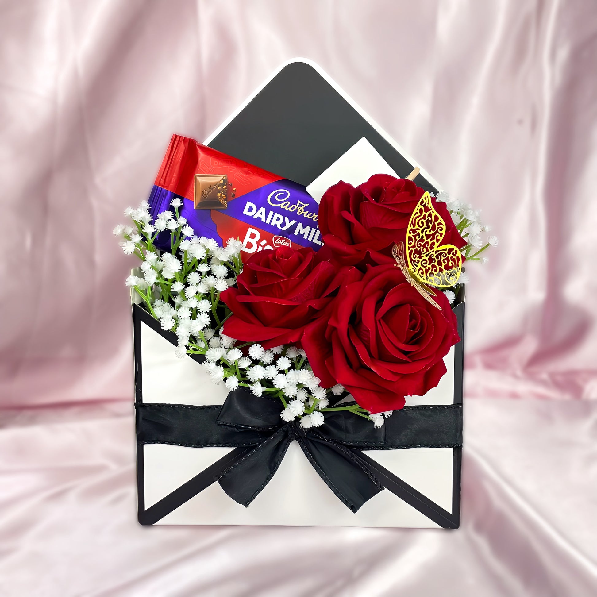 Stunning Envelope Style Chocolate & Flower Arrangement - Inc. Cadbury Biscoff Chocolate Bar, 3x Red Forever Roses & Personalised Postcard