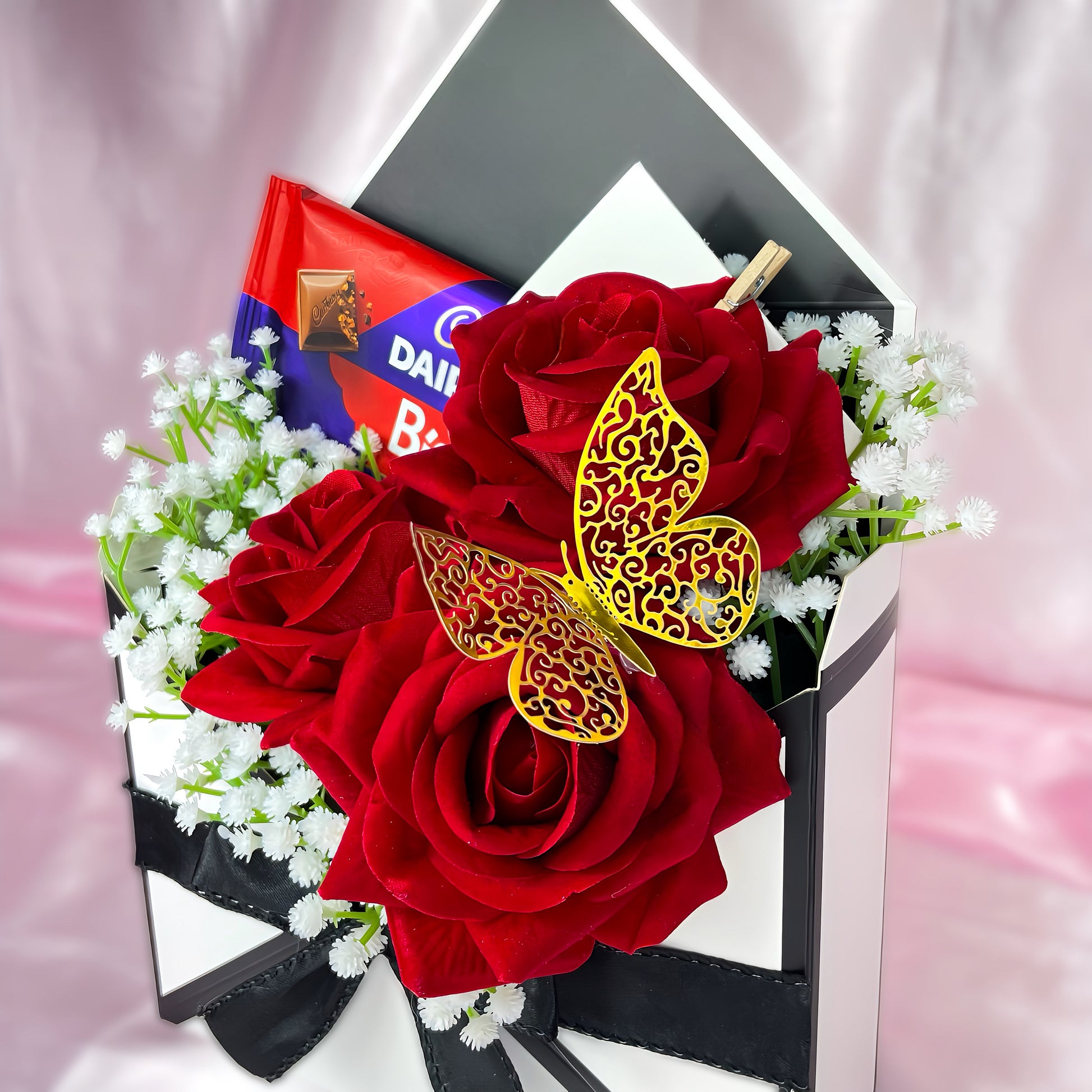 Stunning Envelope Style Chocolate & Flower Arrangement - Inc. Cadbury Biscoff Chocolate Bar, 3x Red Forever Roses & Personalised Postcard